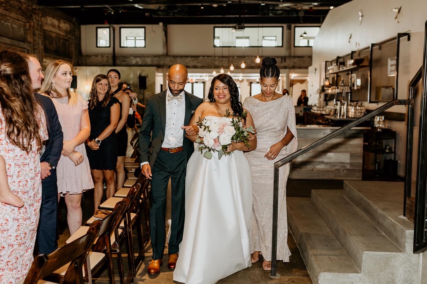 parents walking the bride