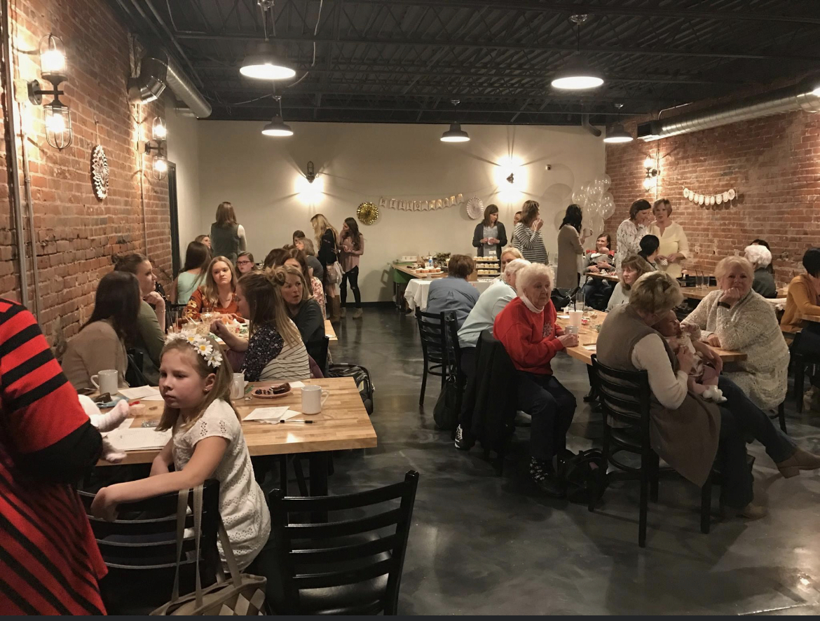 people mingling at tables at Gopher's Grill