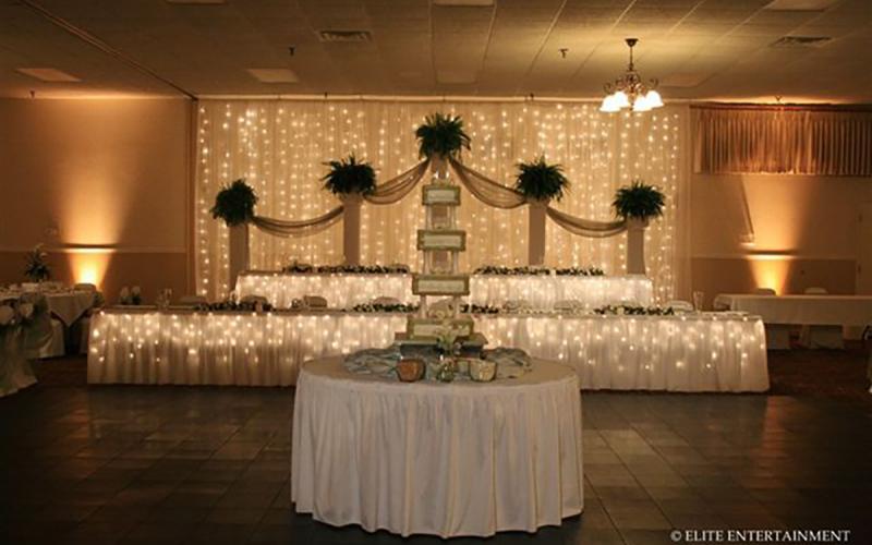 wedding party tables and wedding cake table setup at Effingham Event Center